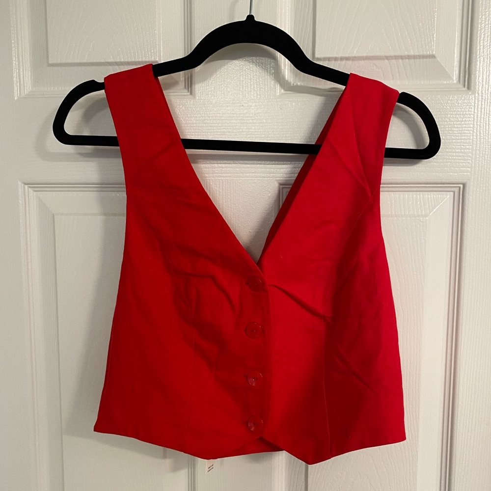 Vibrant red crop top vest, perfect with high rise bottoms